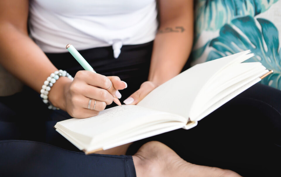 Woman with planner and pen