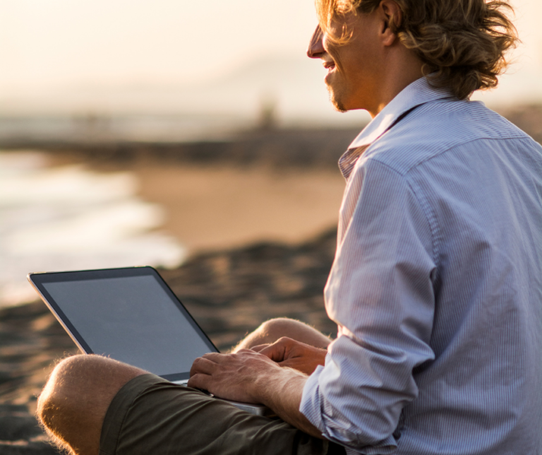 man laptop beach